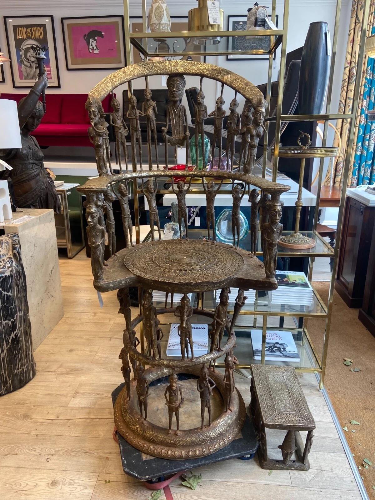 Rare African Bronzed Tikar Throne with Stool, Handcrafted Tribal piece from Cameroon

This stunning and intricate bronzed throne with matching stool is an authentic example of Tikar tribal craftsmanship from Cameroon, West Africa. It's an