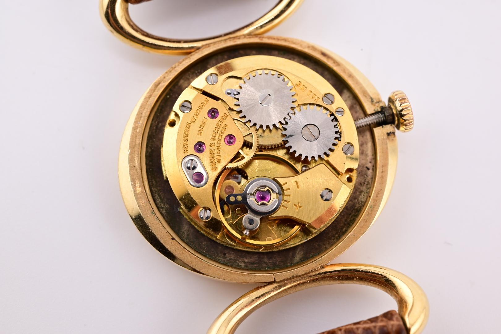 Exceptionnelle montre-bracelet Baume Mercier pour femmes avec cadran œil de tigre en or jaune 18 carats en vente 3