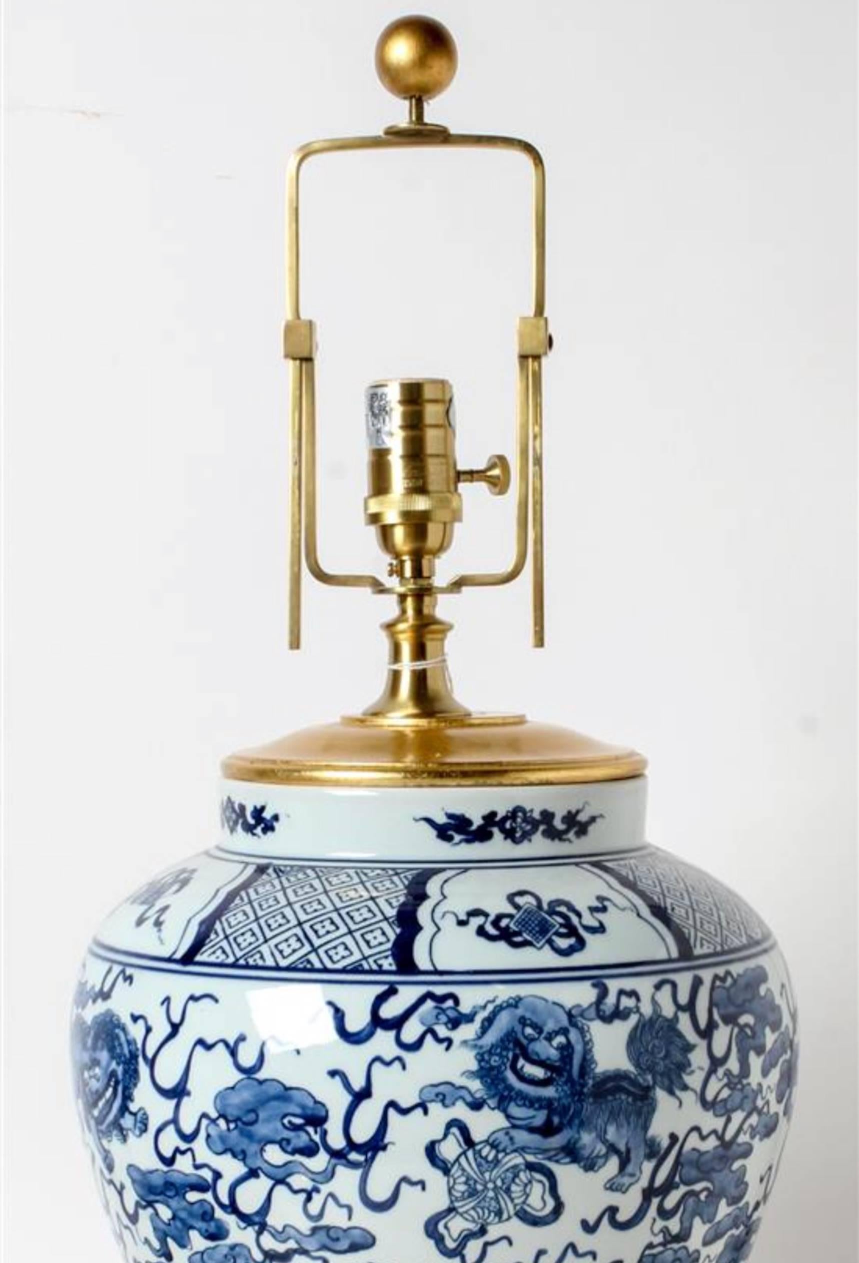 Exceptional blue and white vase on giltwood base mounted as lamp. Timeless Ralph Lauren.  We also have a large collection of blue and white porcelain.  Feel free to call or email with questions.