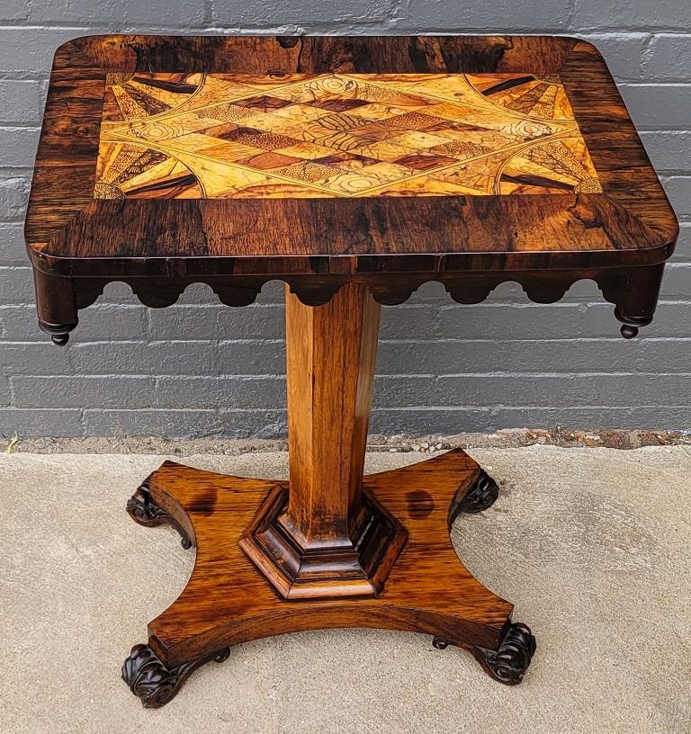 PRESENTING A GORGEOUS, UNIQUE and INTRIGUING Early 19C British Colonial Specimen Wood Side Table from circa 1830, the reign of William IV.

Rosewood veneered top inlaid with various exotic and rare specimen woods in geometric shapes and fan