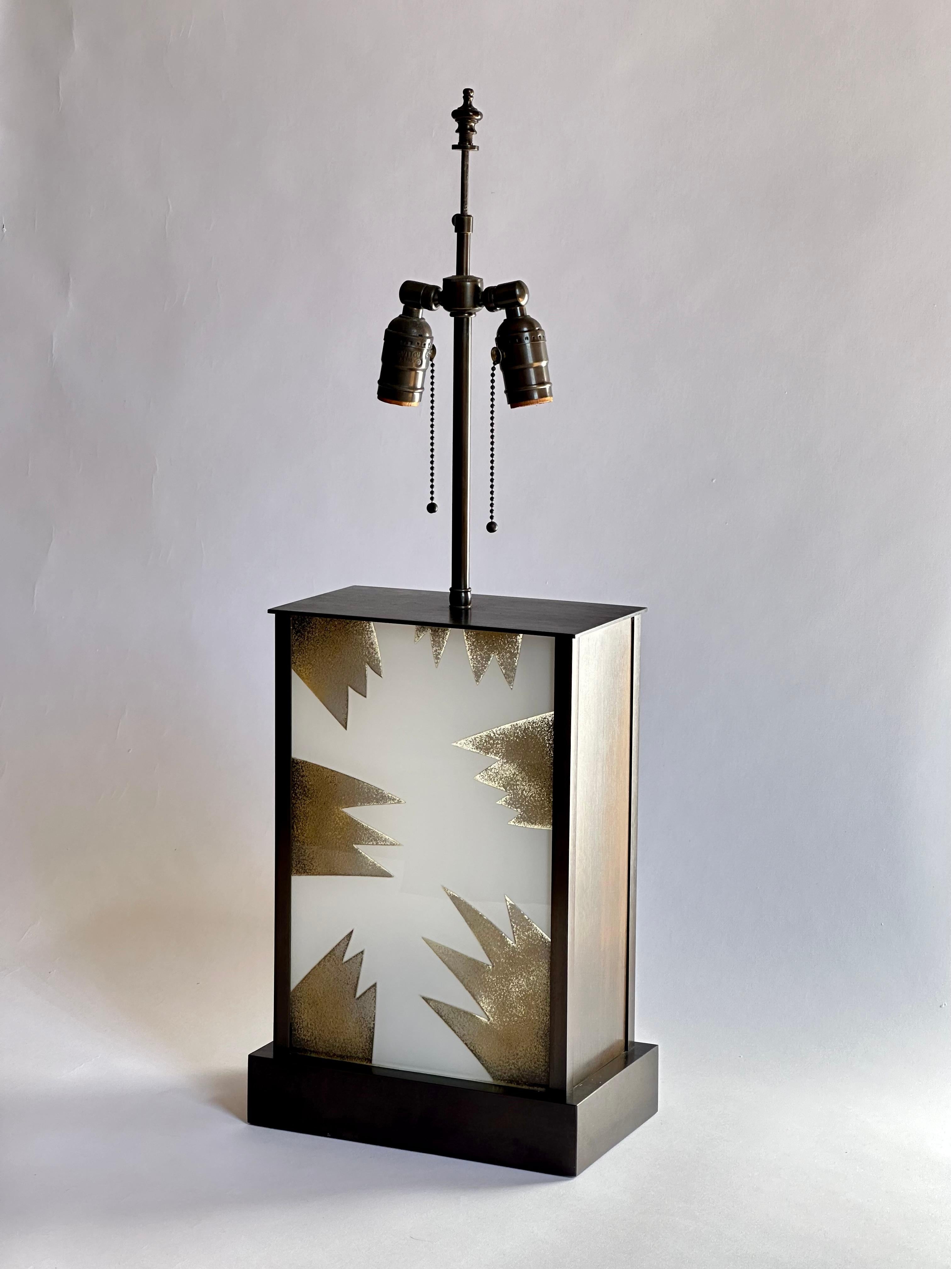 Bronzed Exceptional Bronze and Reverse Painted Glass Illuminated Modern Table Lamp For Sale