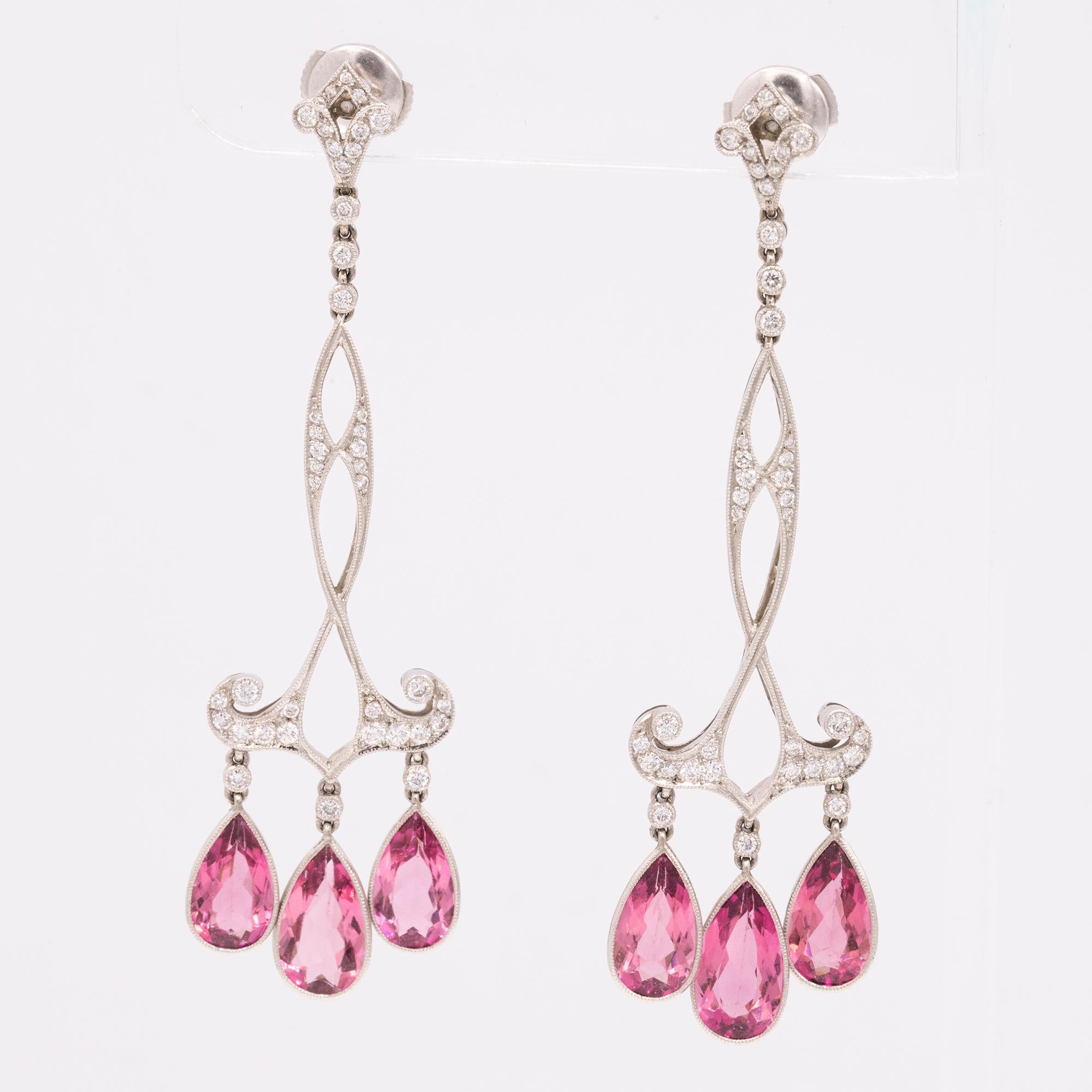 Tourmalines come in a wide variety of exciting colors. In fact, tourmaline has one of the widest color ranges of any gem species, occurring in various shades of virtually every hue.

Handwrought in precious platinum, these striking earrings