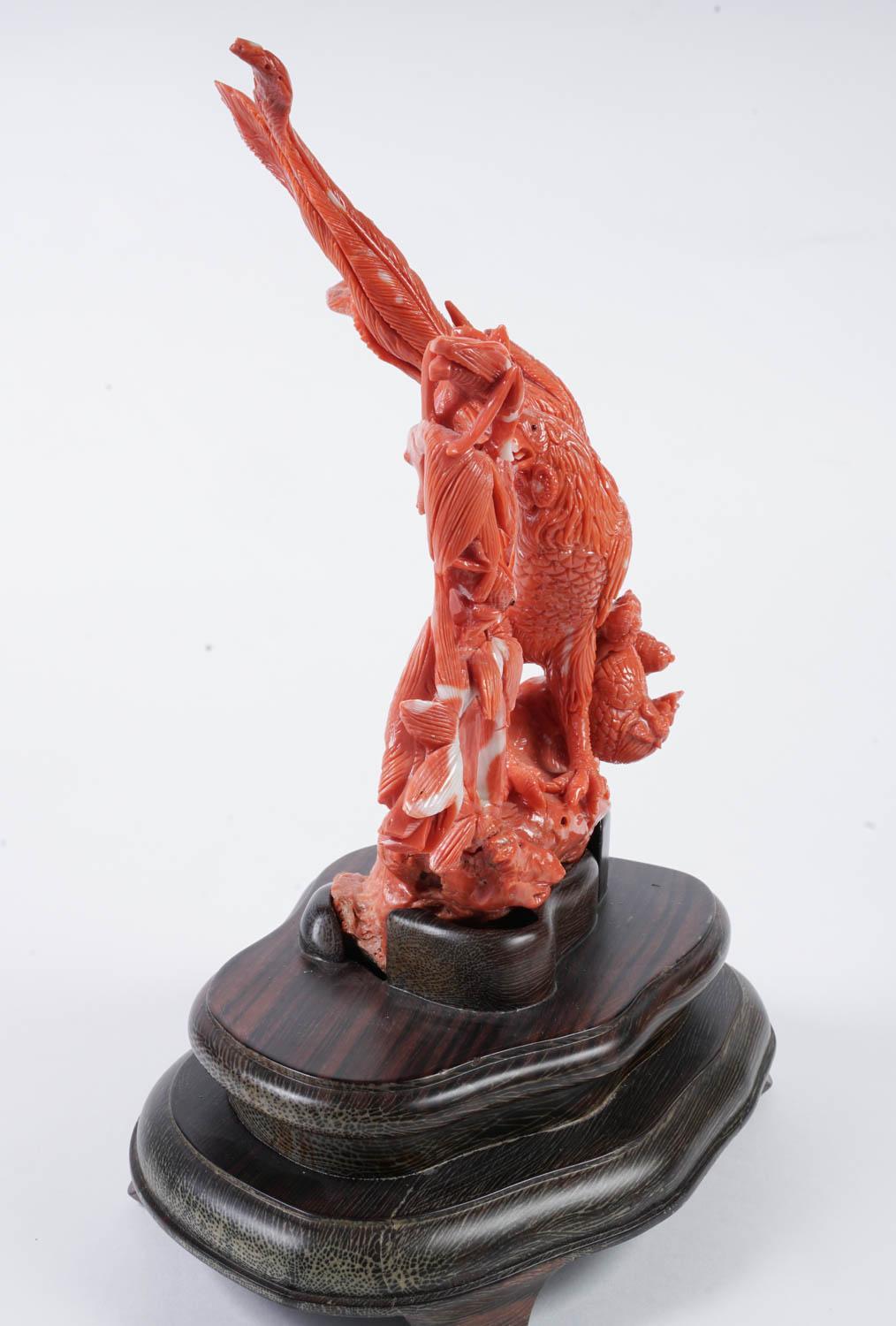 An exceptional Chinese carved coral figural group of a rooster with hens

Very finely carved. With original wooden base.

Coral: 7.5
