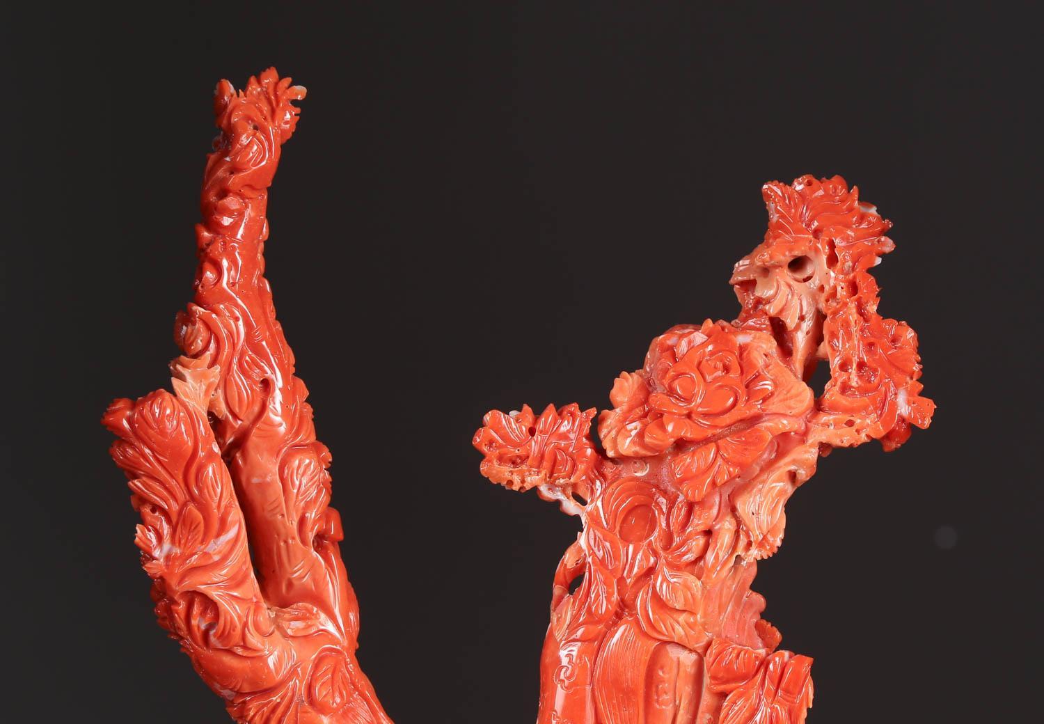 An exceptional Chinese carved coral figural group of immortals

Very finely carved. With original wooden base.

Measures: Coral: 11.5