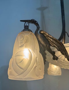 Eccezionale lampadario Art Deco "Crane" in ferro e vetro di Degué, Francia, anni '20