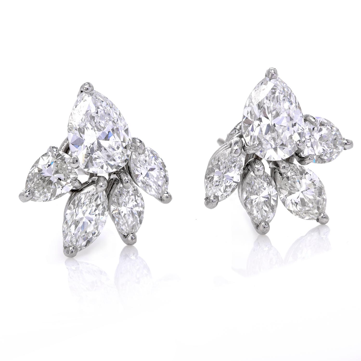 These exceptional earrings were inspired in a floral motif and crafted in  Luxurious Platinum.

Featuring two faceted large Pear shape diamonds in ears, weighing approx 0.86 carats and 0.96 carats. Both pear diamonds are GIA graded, D Color, SI1