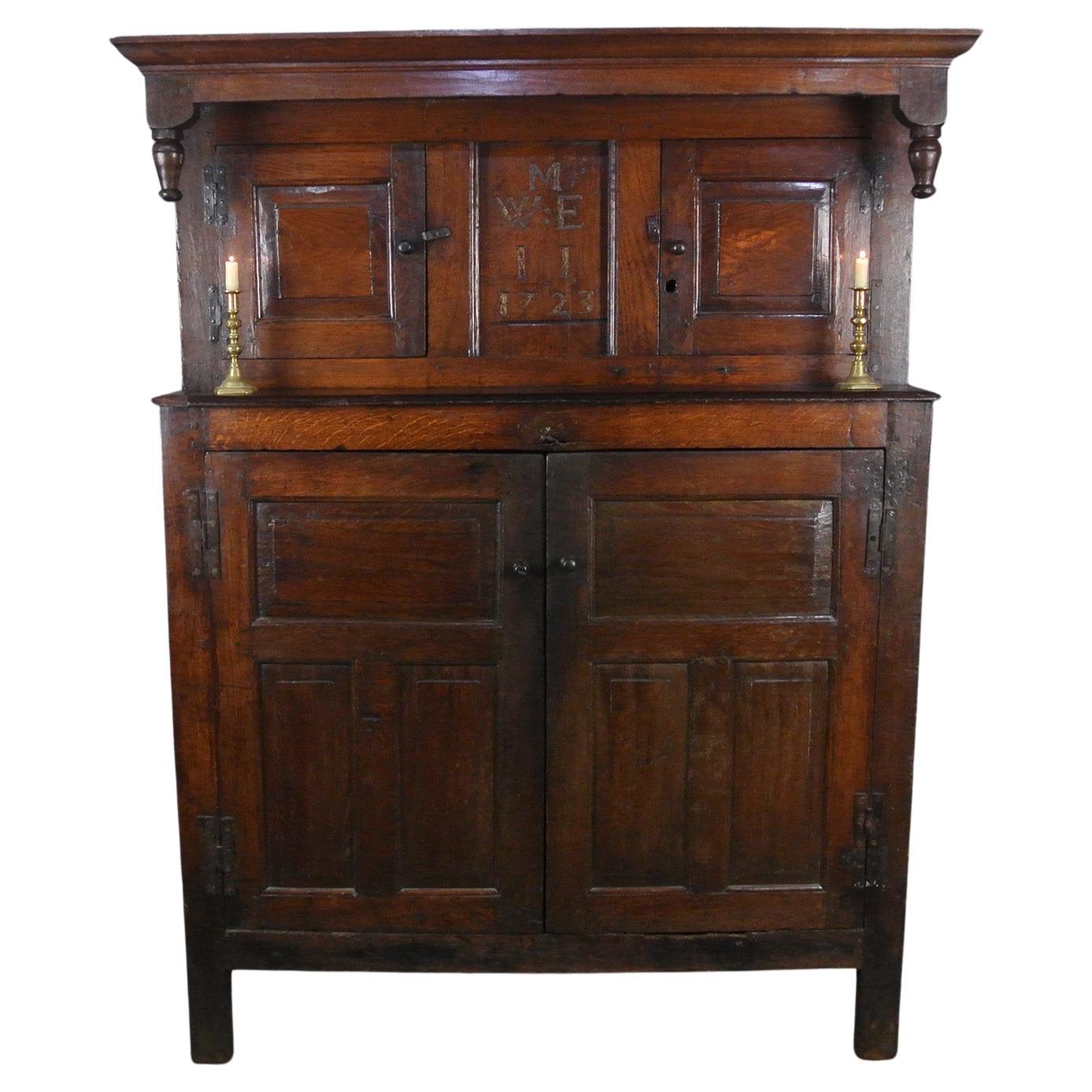 Exceptional Dated English Oak Press Cupboard with Secrets - 1723 For Sale