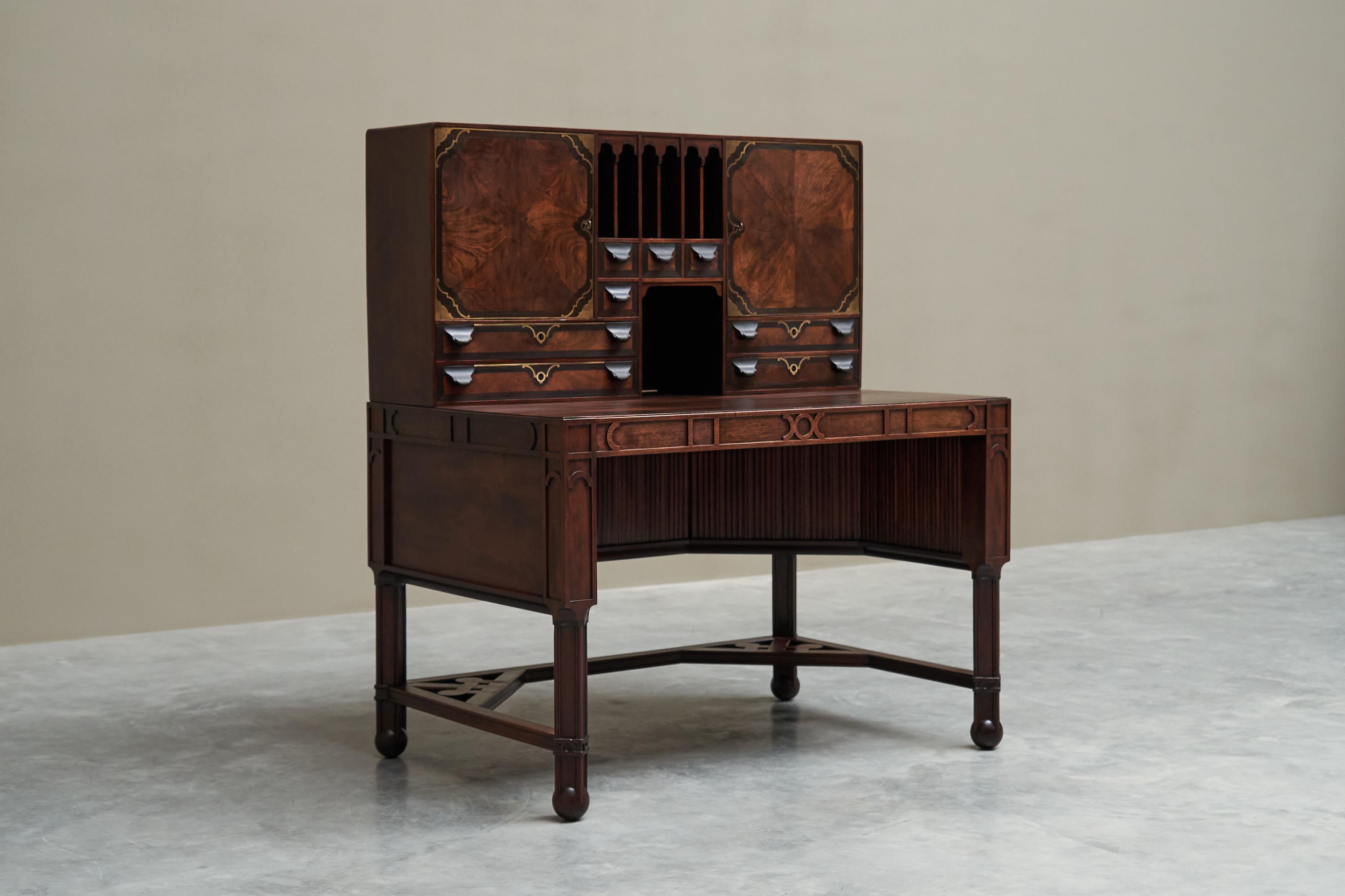 Exceptional Secretary Desk in Mahogany, Walnut, Ebony and Brass Early 20th Century

This unique desk is one of the most exceptional pieces of furniture we have ever seen. Truly museum worthy.

An early 20th century European cabinetmaker secretary