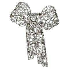 Exceptional Diamond Platinum Bow Brooch