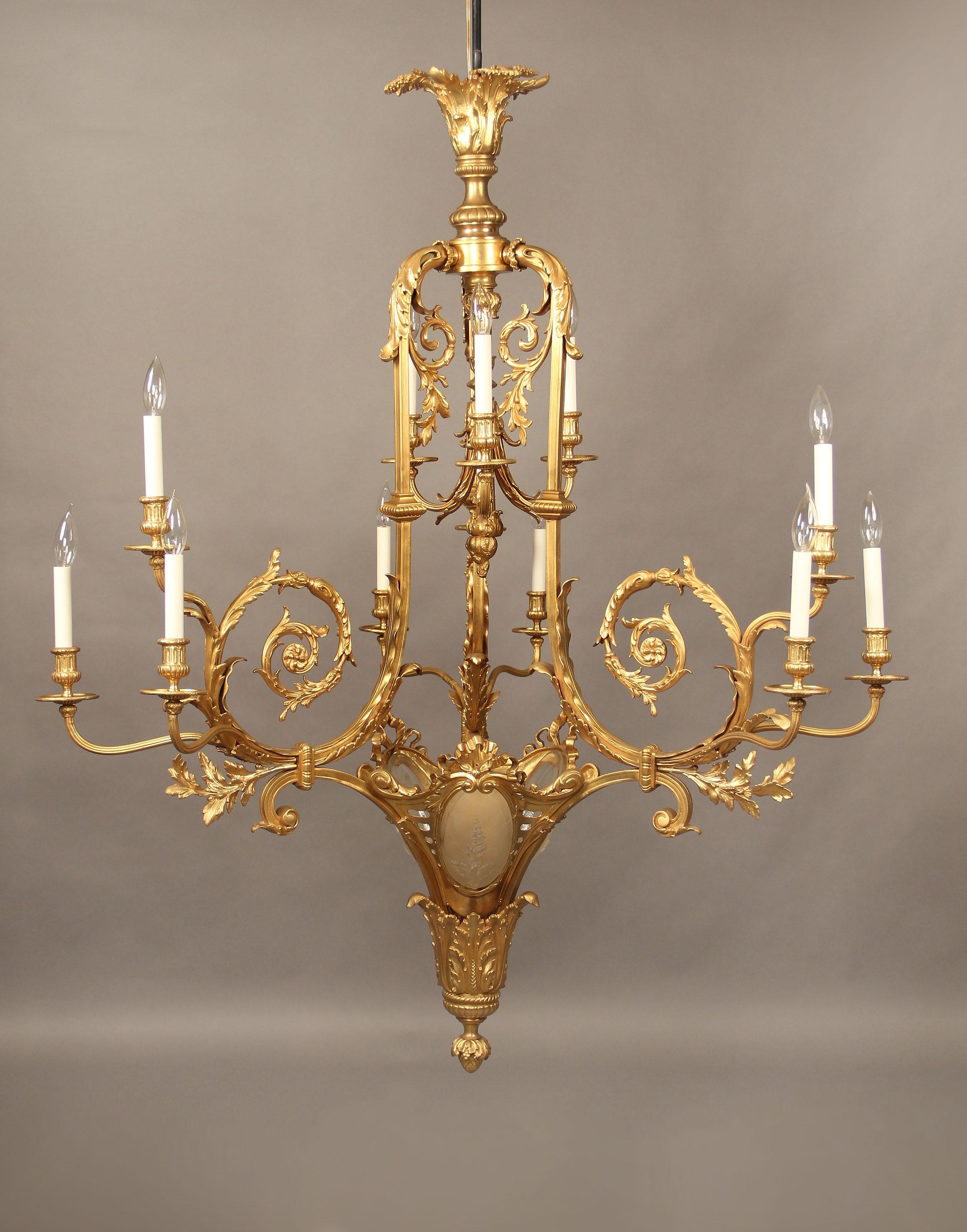 An exceptional early 20th century gilt bronze fifteen light chandelier.

Great quality bronze casts, foliate scrolled arms with an etched glass base, 12-tiered perimeter and three interior lights.

If you are looking for a chandelier, a lantern