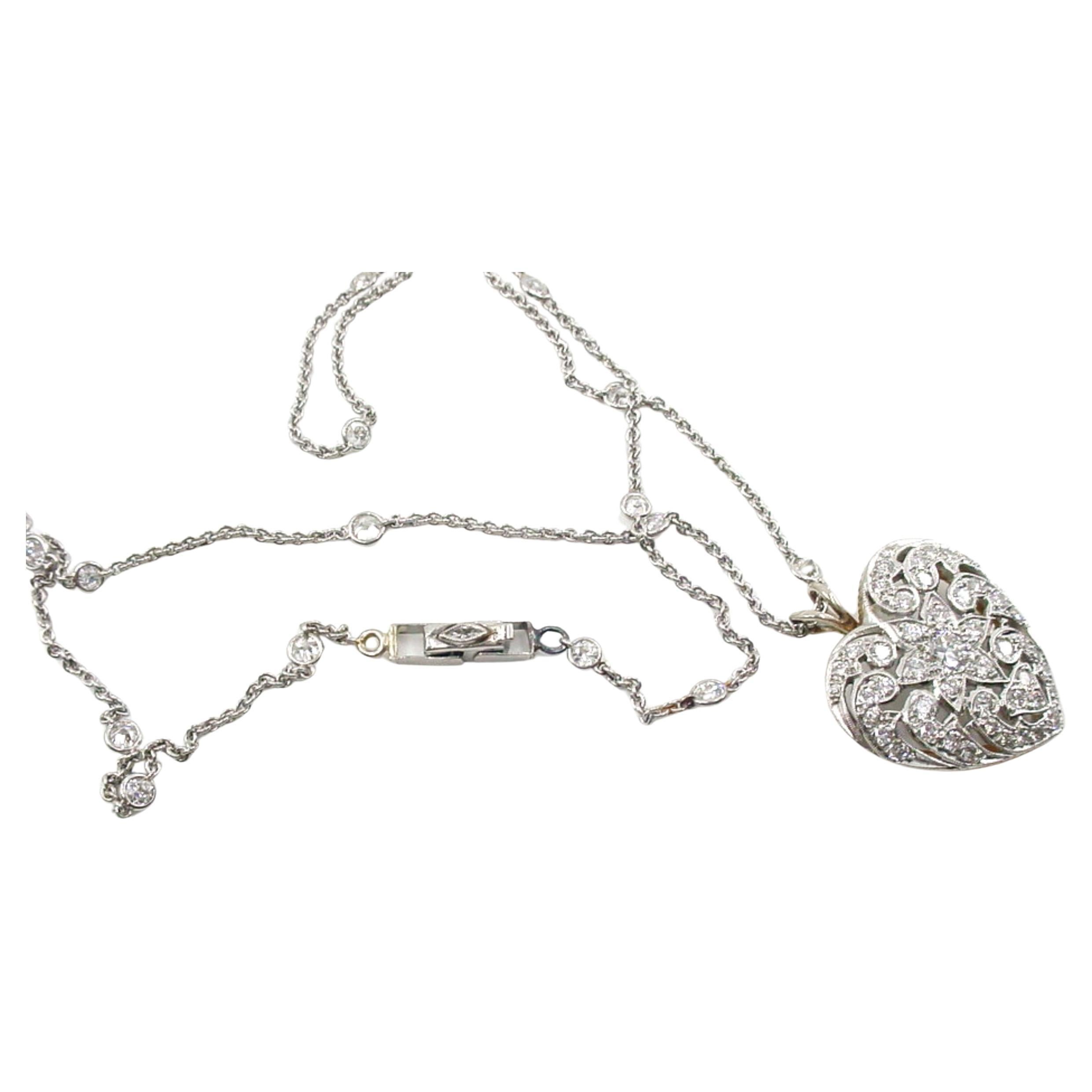 Exceptional Edwardian Platinum 1.95 OEC Heart and Diamond Station Chain Necklace For Sale