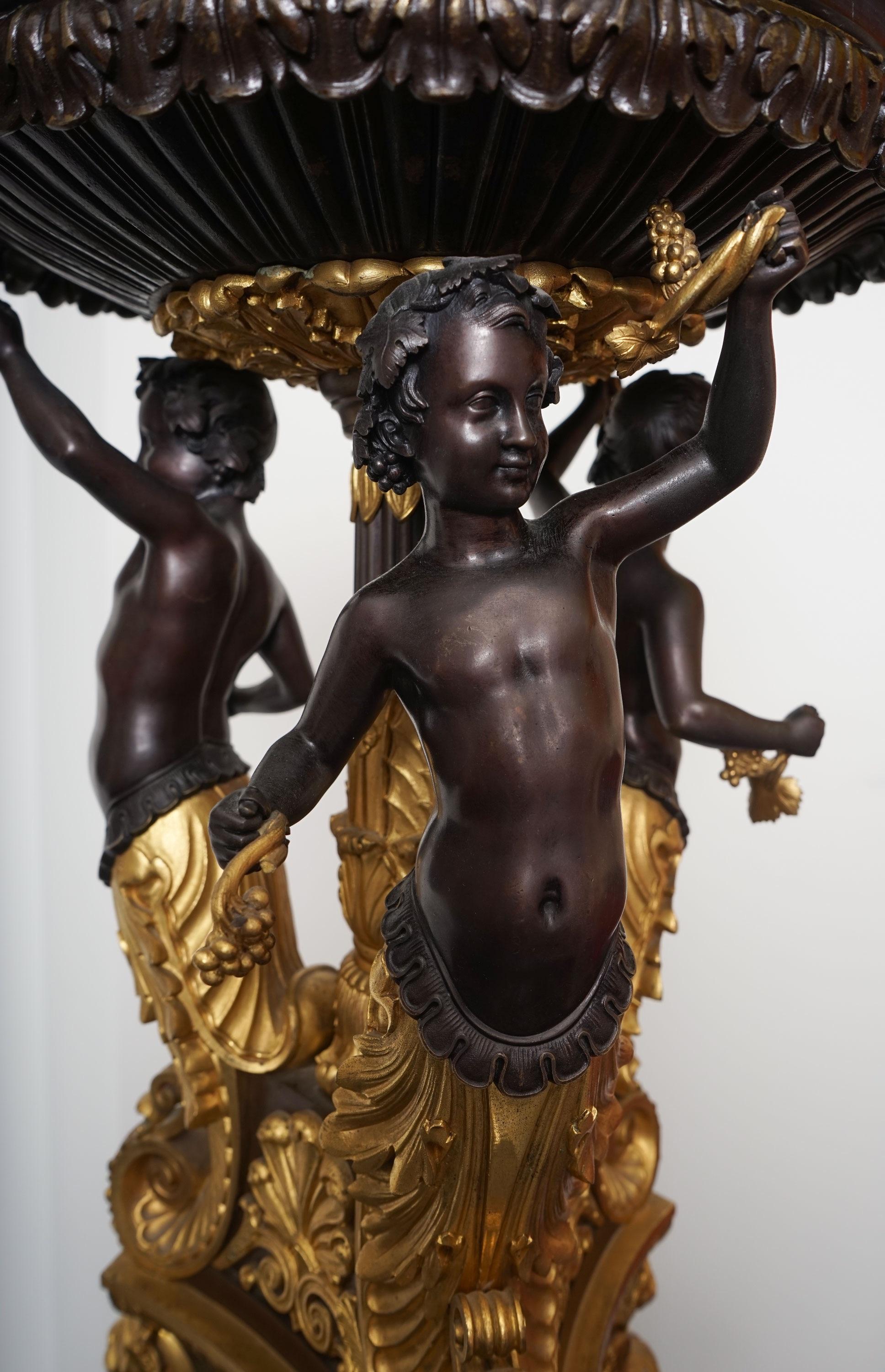 Empire style center piece - Homage to Bacchus
Italy
Bronze and marble
Measures: 62 x 37 cm; 24.4 x 14.5 in.