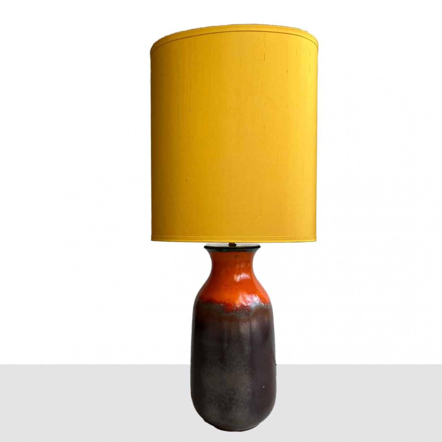 'Fat Lava' style ceramic large table or floorlamp with glaze. Manufactured in West-Germany in the 1970's.
The style of the glaze is called 'Fat Lava'. Which means the glaze is thick on some parts, like lava.
A typical way to finish ceramic in