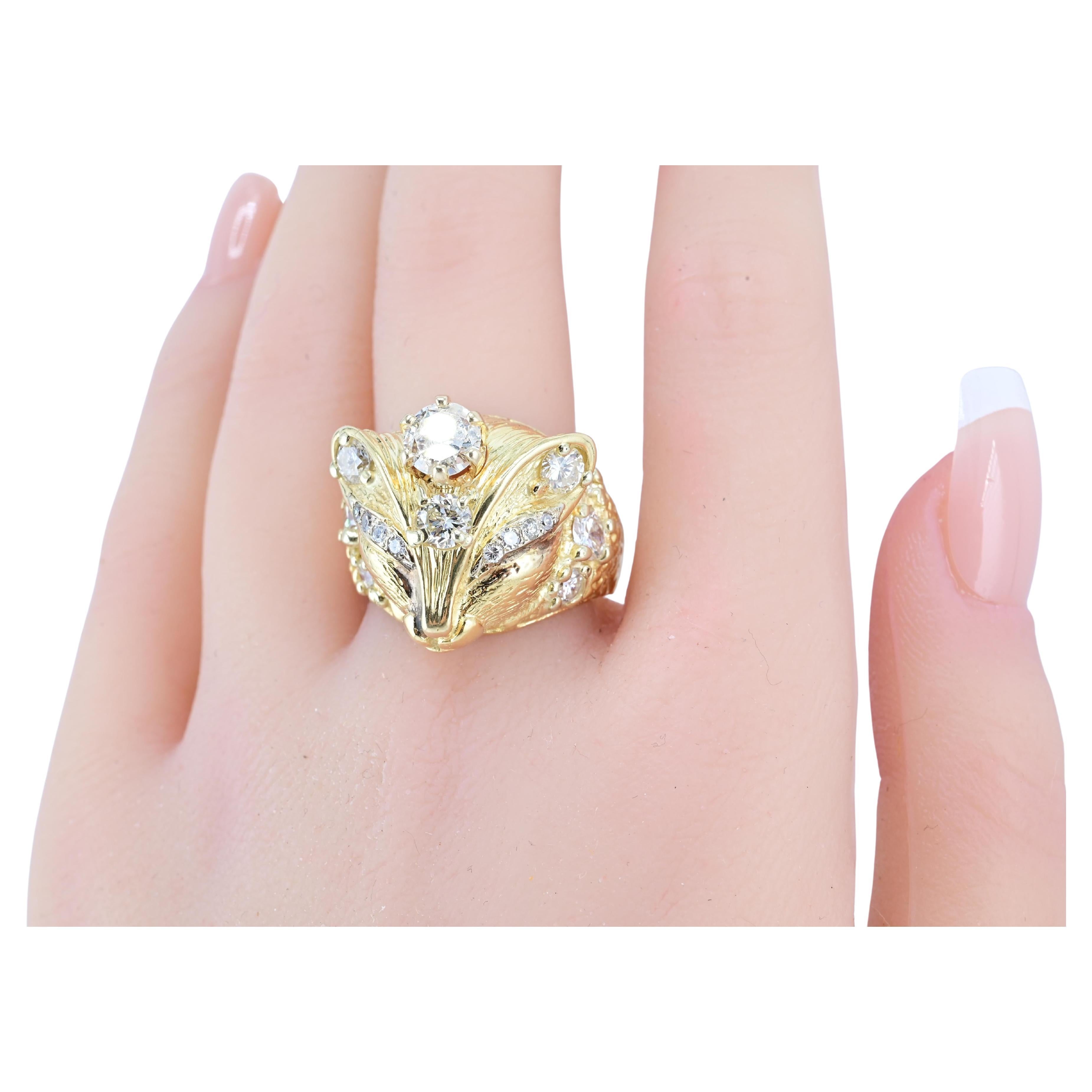 This is a gold fox ring adorned with diamonds, crafted in a bold and intricate animal-inspired design.

Design Features:
	•	Fox Motif: The ring is sculpted in the shape of a fox’s head, with finely detailed fur texture and a lifelike facial