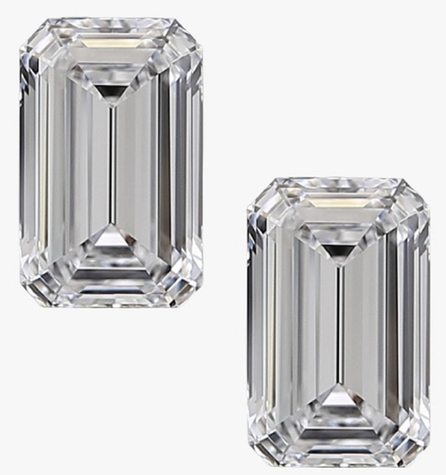 A perfect match of flawless emerald cut diamonds the perfect Christma's gift mounted in solid platinum with double delicate prongs for major security and la pousette backs.

We can change the mounting to push backs.