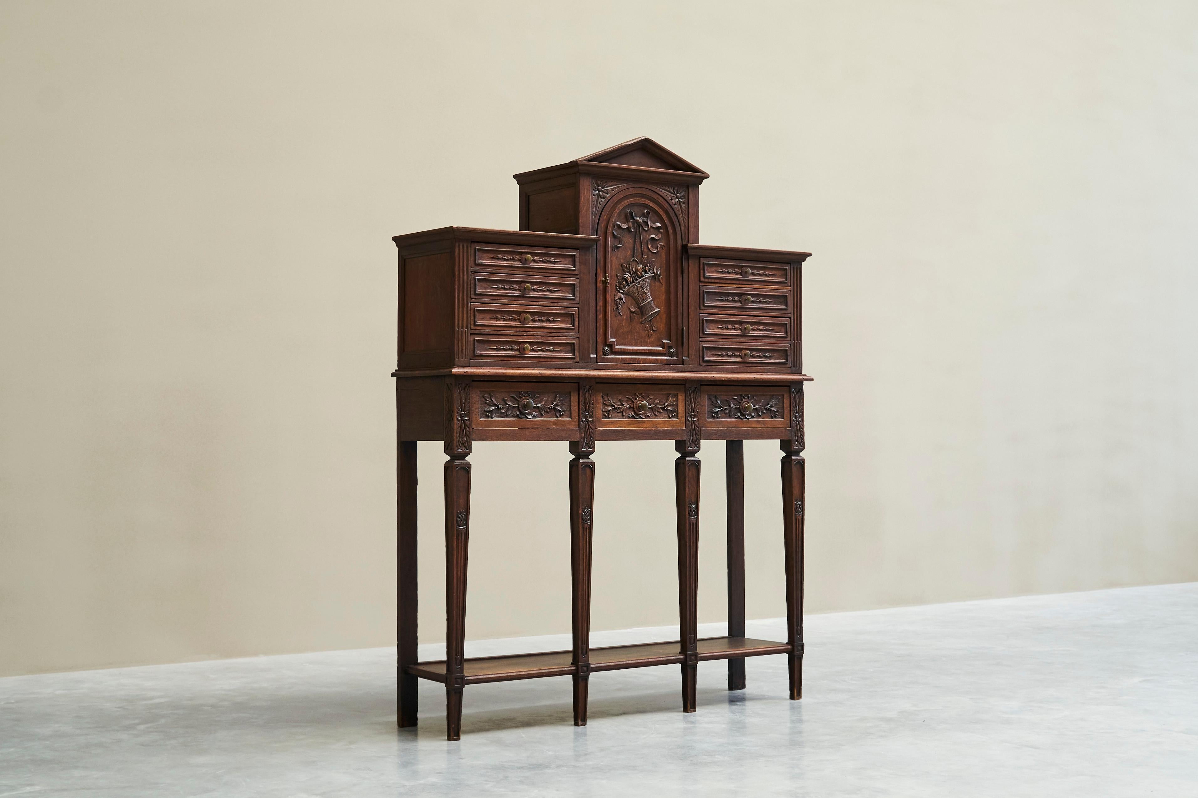 Exceptional Flemish Treasure Cabinet in Carved Oak Late 19th Century

A unique and very distinct late 19th century Flemish raised treasure cabinet in solid carved oak and brass.  

Stands directly in the tradition of the earlier Antwerp / Flemish