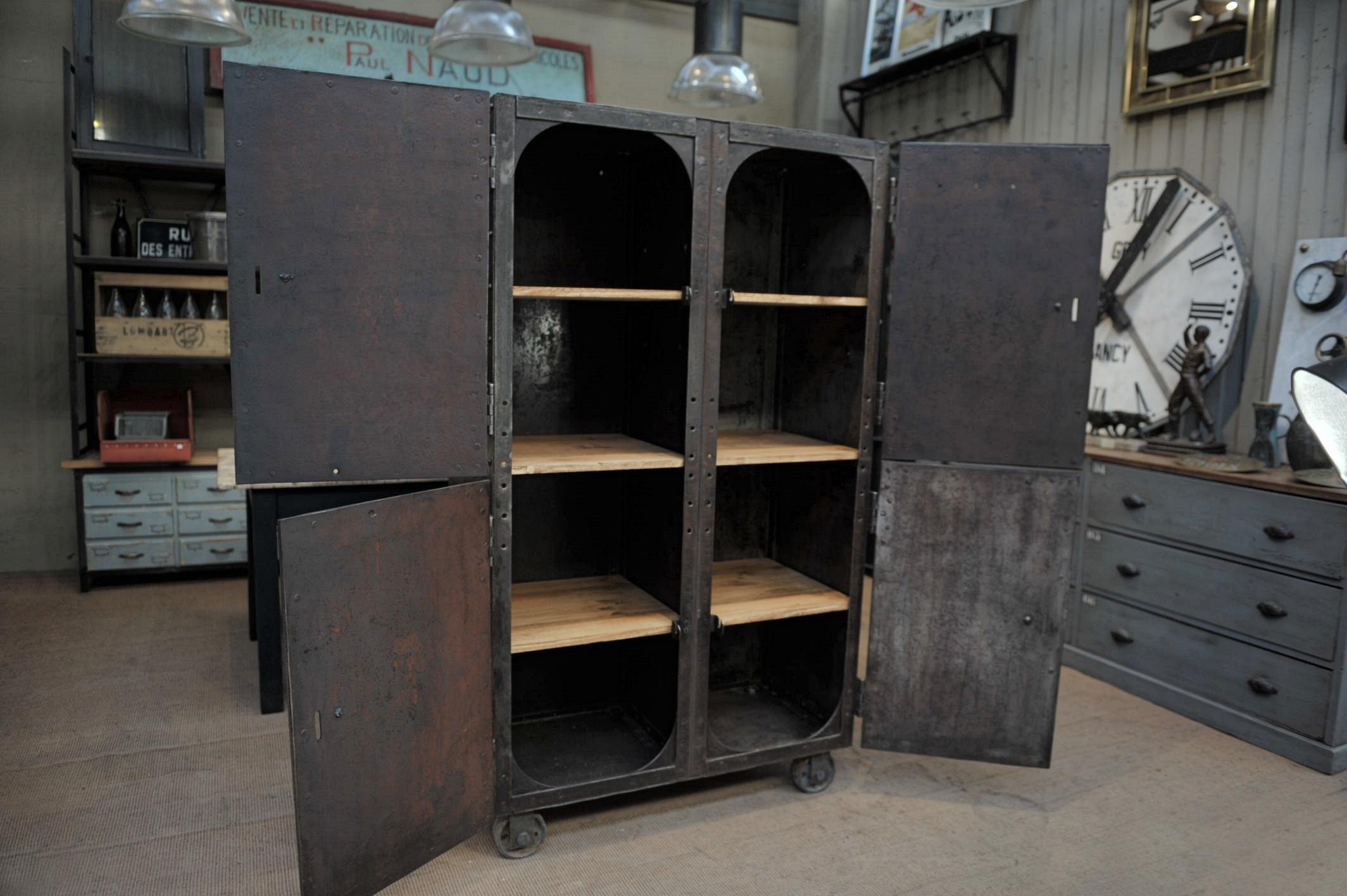Art Nouveau Exceptional Four-Doors Industrial Riveted Iron Cabinet on Wheels, circa 1900