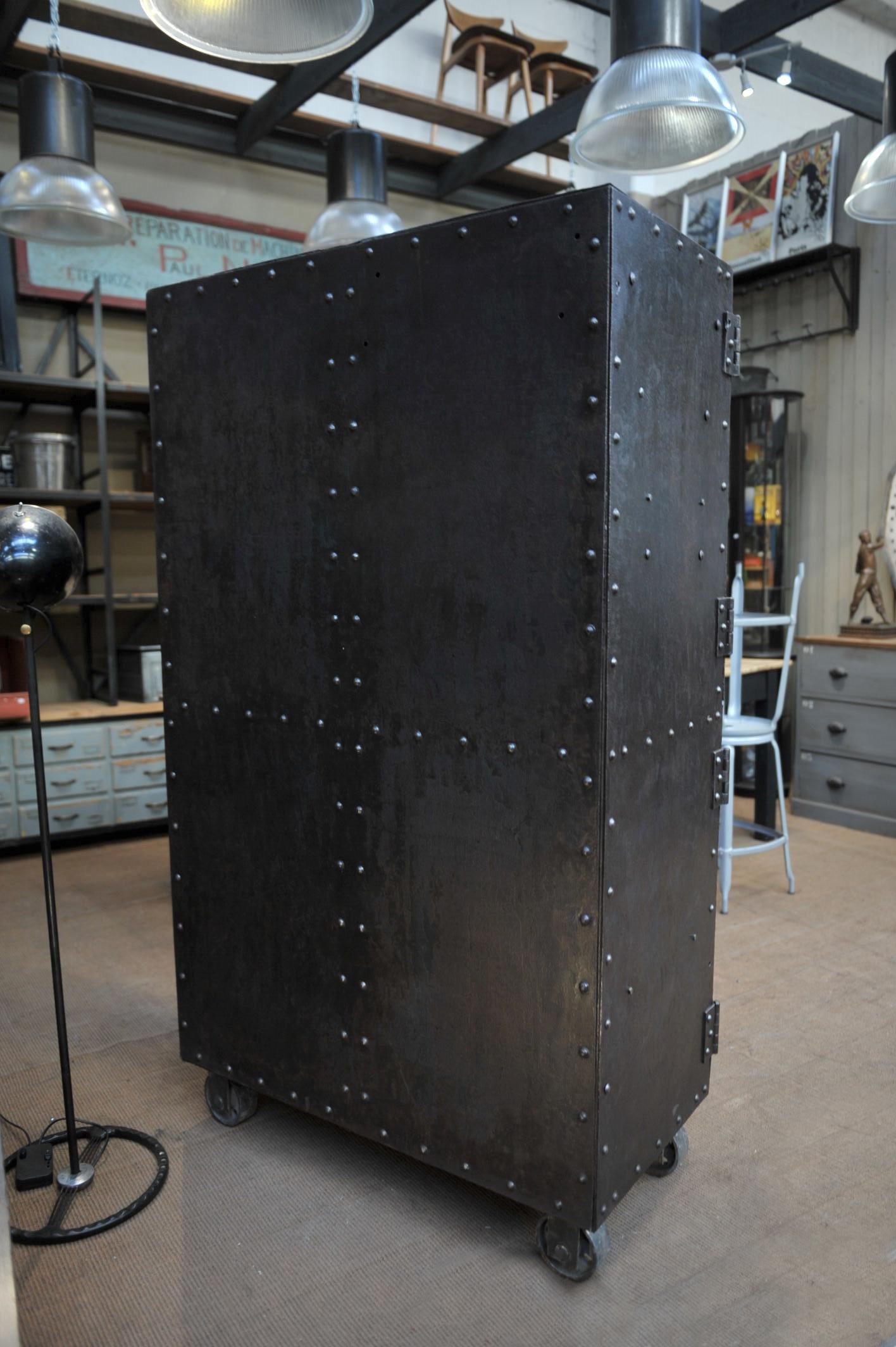 Early 20th Century Exceptional Four-Doors Industrial Riveted Iron Cabinet on Wheels, circa 1900