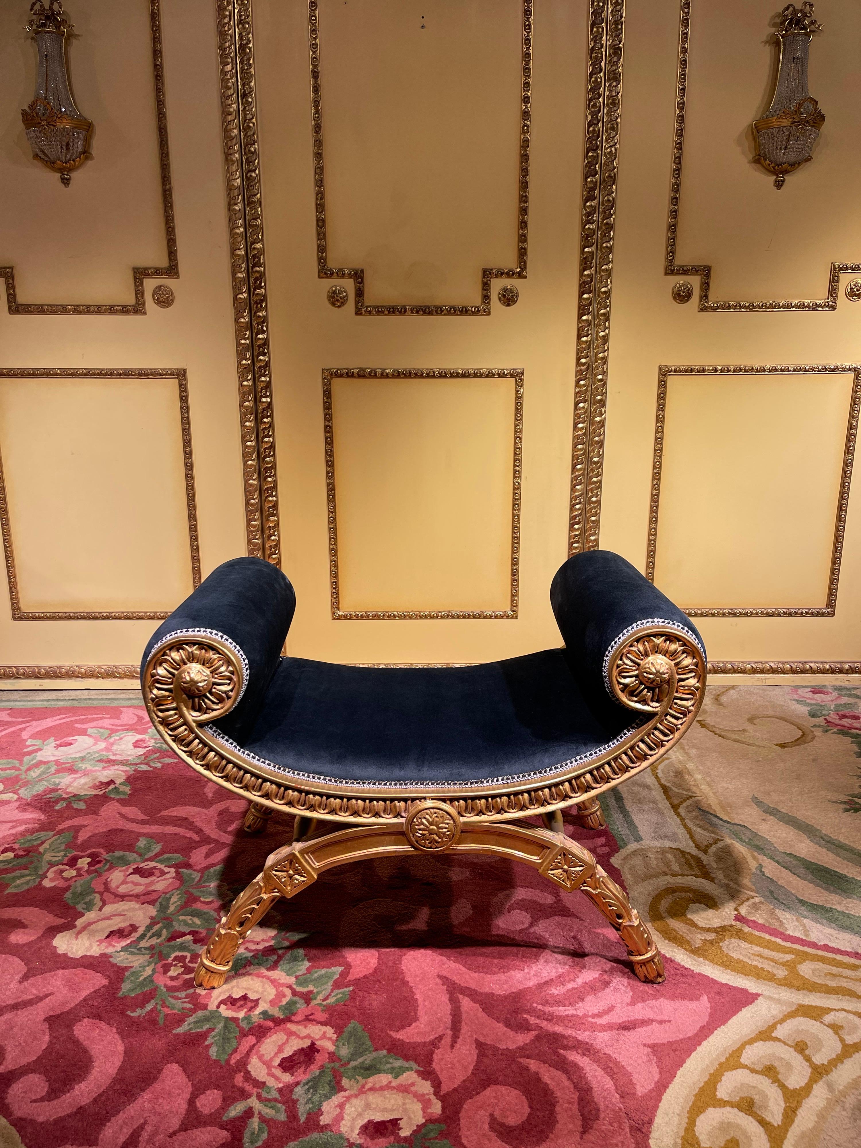 Solid beechwood, finely carved and set. Armrests ending in scrolled volutes. Semicircular frame on four scissor-shaped legs. Below connected by appropriately curly, strongly profiled webs. The seat is finished with a historical, Classic black