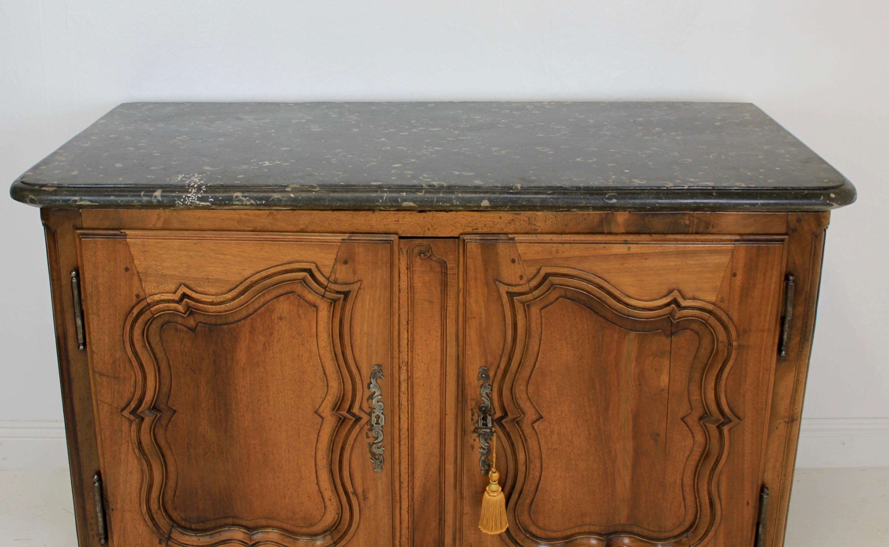 An exceptional French buffet with a thick grey oyster marble top. This buffet is in outstanding condition with its original key and locking mechanism working perfectly. It docent get much better than this.