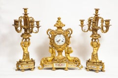 Exceptional French Ormolu-Mounted Porcelain Three-Piece Clock Garniture Set