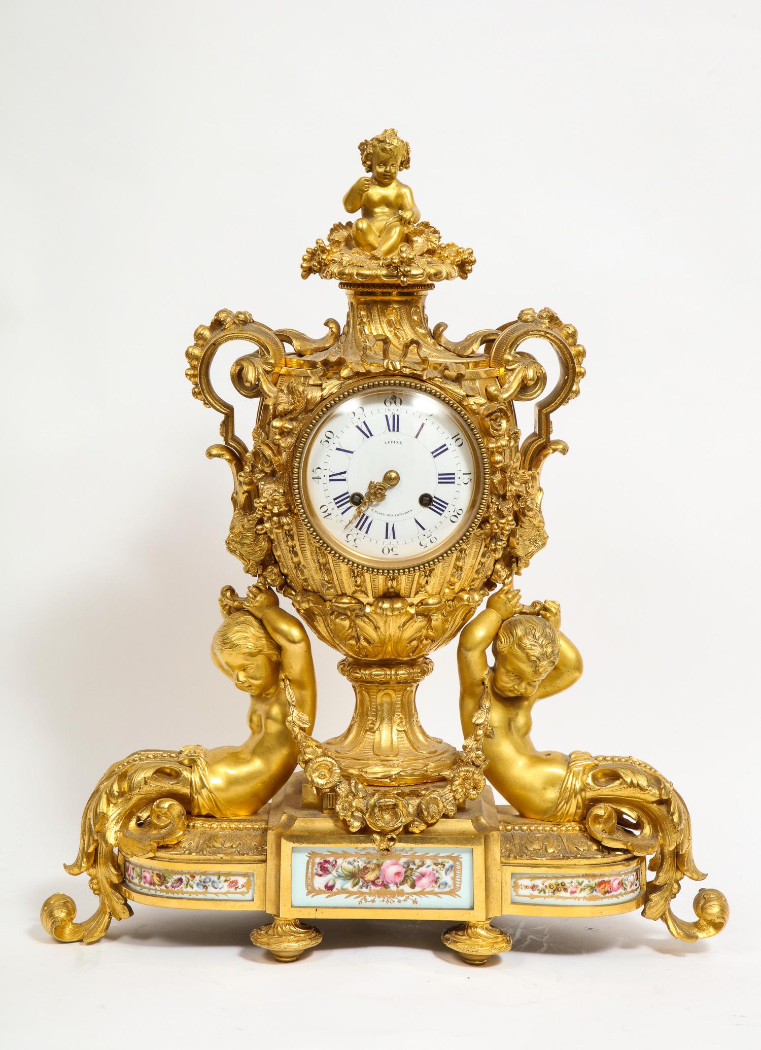 Napoleon III Exceptional French Ormolu-Mounted Porcelain Three-Piece Clock Garniture Set