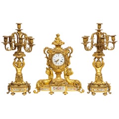 Exceptional French Ormolu-Mounted Porcelain Three-Piece Clock Garniture Set