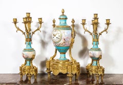 Exceptional French Ormolu-Mounted Turquoise Jeweled Sevres Porcelain Clock Set