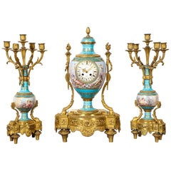 Exceptional French Ormolu-Mounted Turquoise Jewelled Sevres Porcelain Clock Set