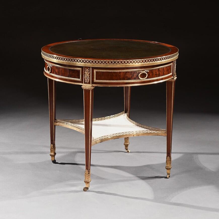 A late 19th century French mahogany and gilt bronze mounted Gueridon or bouillotte table in the Louis XVI style stamped Gervais Durand in wonderful original condition retaining its reversible inset top.

France Circa 1880. 

The Carrara marble