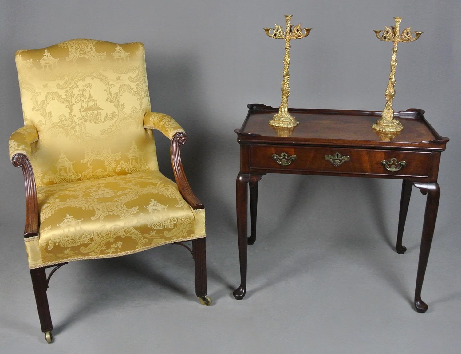 A particularly fine quality Georgian Gainsborough chair.

This exceptional example in superb original condition and extremely comfortable.

Recently upholstered in a Chinoiserie old gold coloured pure silk called ‘Cathay’ which is made by the