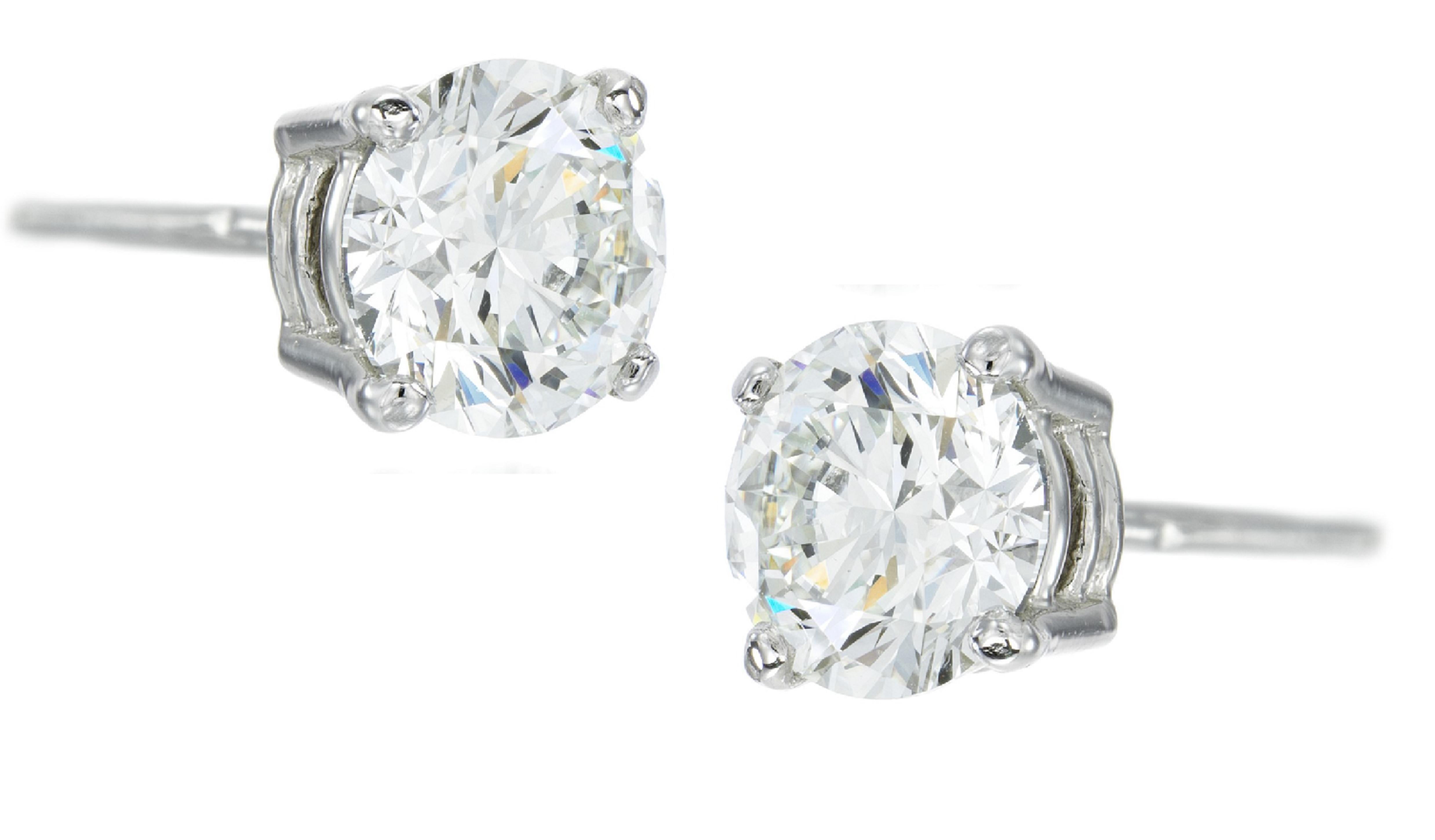 Außergewöhnliche GIA-zertifizierte 10 Karat Diamant-Ohrstecker im runden Brillantschliff 
Ausgezeichnetes Polnisch
Ausgezeichnete Symmetrie
Schwache Fluoreszenz 

J
SI1-2