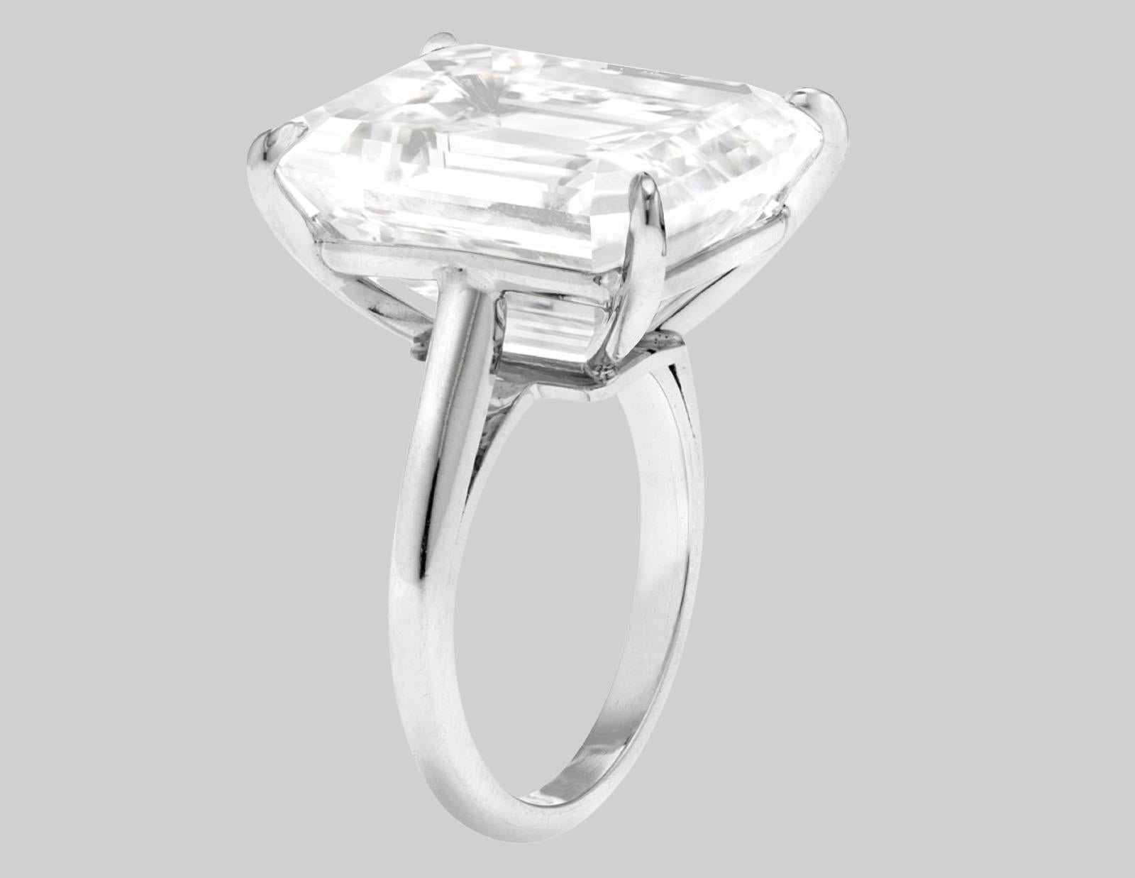 This exquisite ring features a GIA-certified Emerald cut diamond, elegantly presented in a classic solitaire setting, exemplifying sophistication and timeless design.

**Center Diamond:**  
At the heart of this remarkable piece is an 17-carat