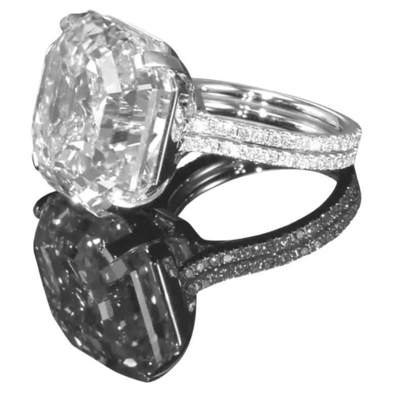 This exquisite engagement ring features a breathtaking 4 asscher emerald cut diamond, certified by GIA for its outstanding quality. Set in timeless platinum, the diamond boasts a rare combination of clarity and brilliance. 

With a  colorless D