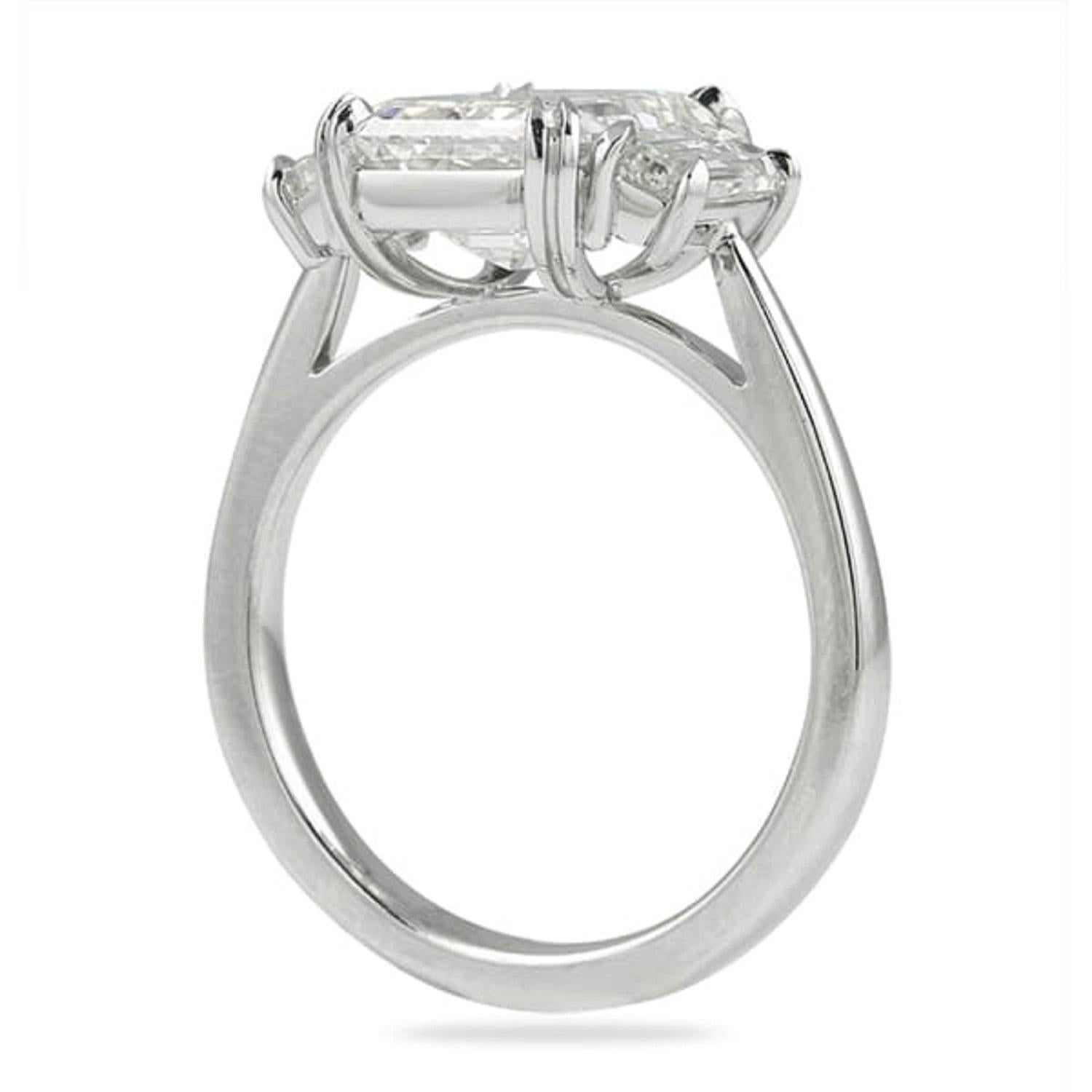 Contemporary GIA Certified 4.01 Carat Emerald Cut Diamond Ring with Trapezoid Diamonds For Sale