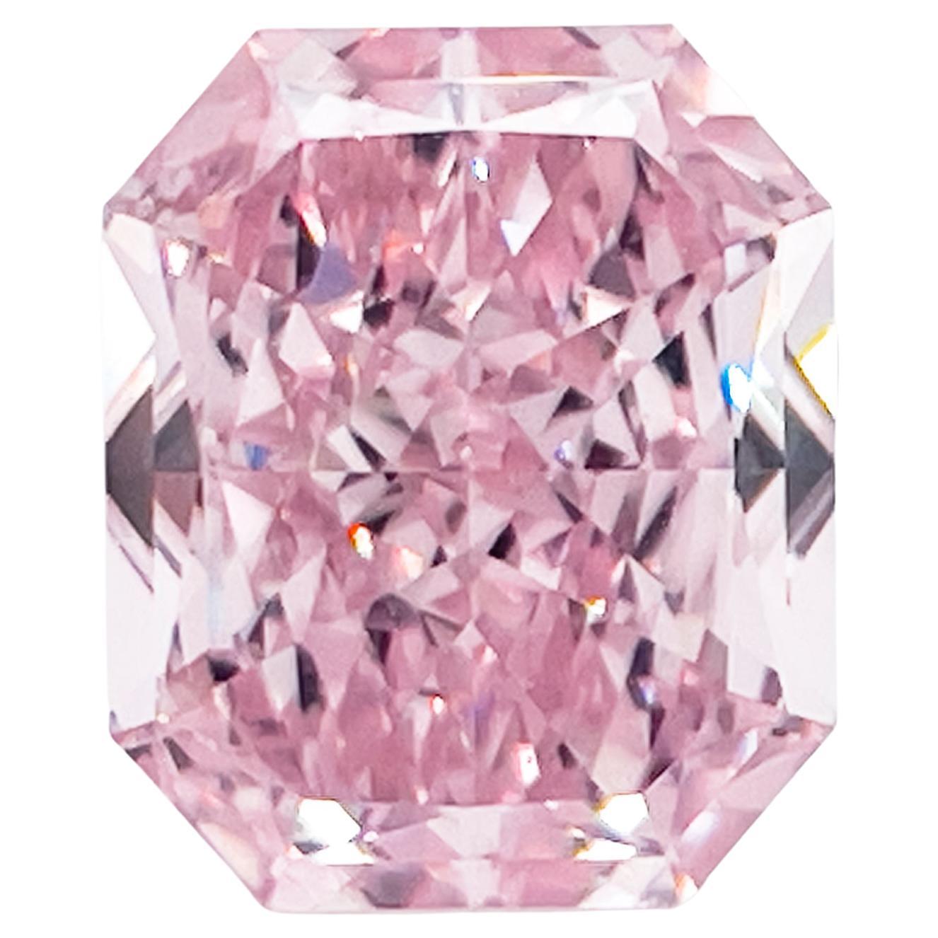 EXCEPTIONAL GIA Certified 3.23 Carat Fancy Pink 
INVESTMENT GRADE
Even color
Internally flawless Clarity

The main stone weighs 3.23 carats 