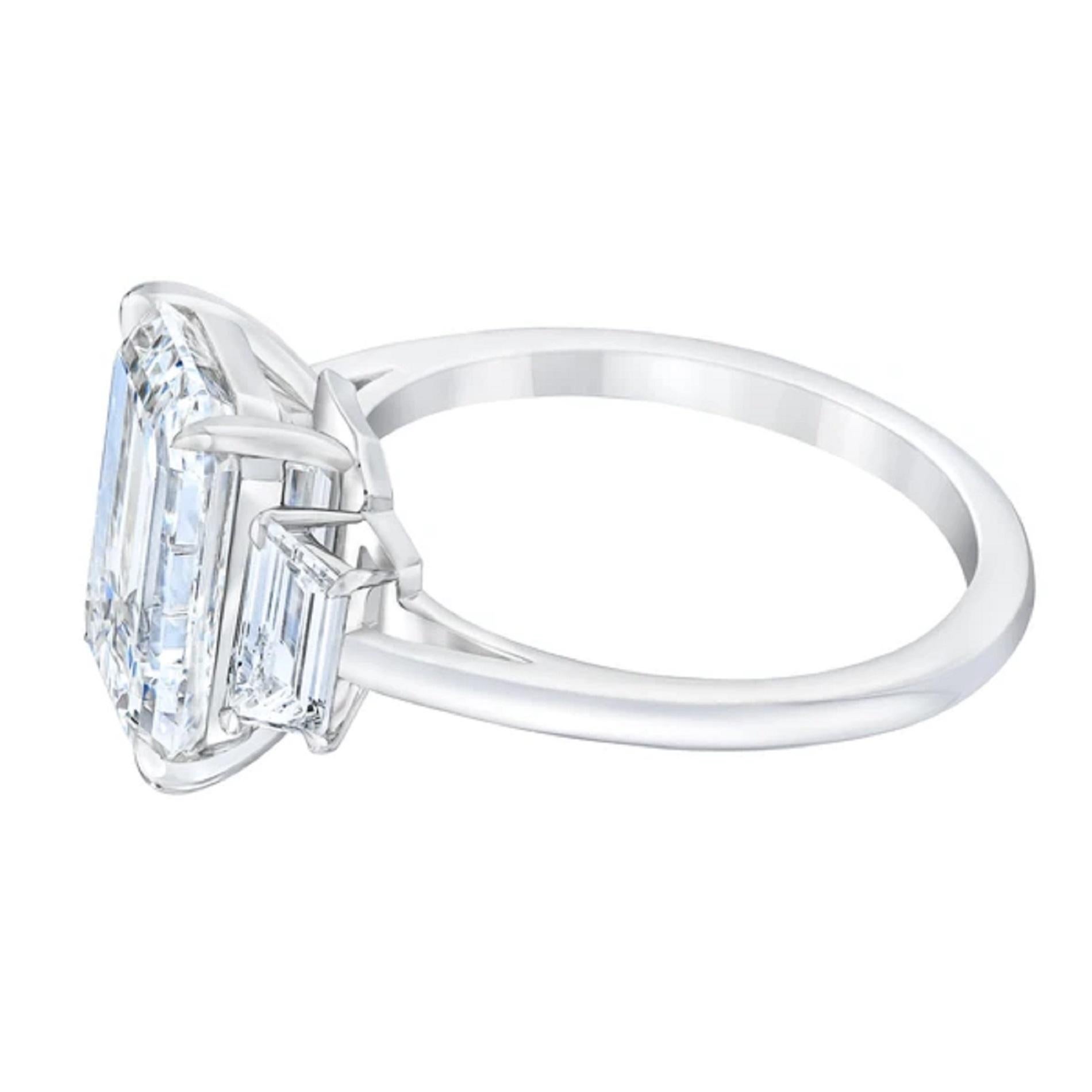 An extraordinary GIA certified 5 carat emerald cut diamond ring.
The main stone is an i color vs1 Clarity 100%eye  clean stone
Excellent luster and excellent performance
None Fluorescence

Please take a look at the video price is exceptional also