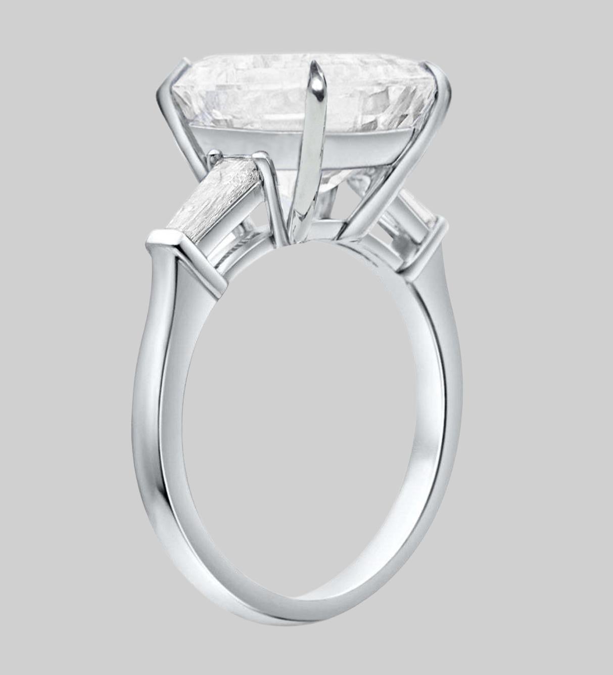 GIA Certified 5 Carat Oval Diamond Platinum Ring.
The Ring is made in 18 carats white gold with a beautiful Oval Diamond.
The main Diamond has classified  by the GIA with Internally VS2 in Clarity and F in Color.
