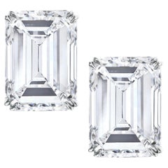 Exceptional GIA Certified 5.01 Carat Emerald Cut Diamond Studs