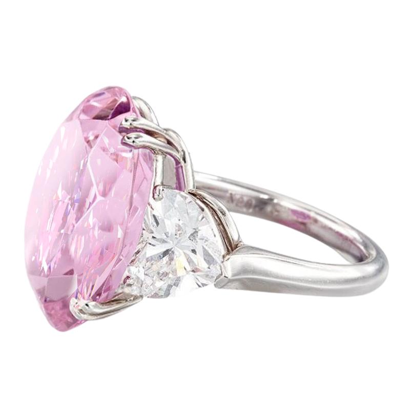 EXCEPTIONAL GIA Certified 6 Carat Fancy Pink Diamond Flawless Clarity Solitaire Ring
the main diamond is for investment purposes 
extremely rare internally flawless
fancy pink even color