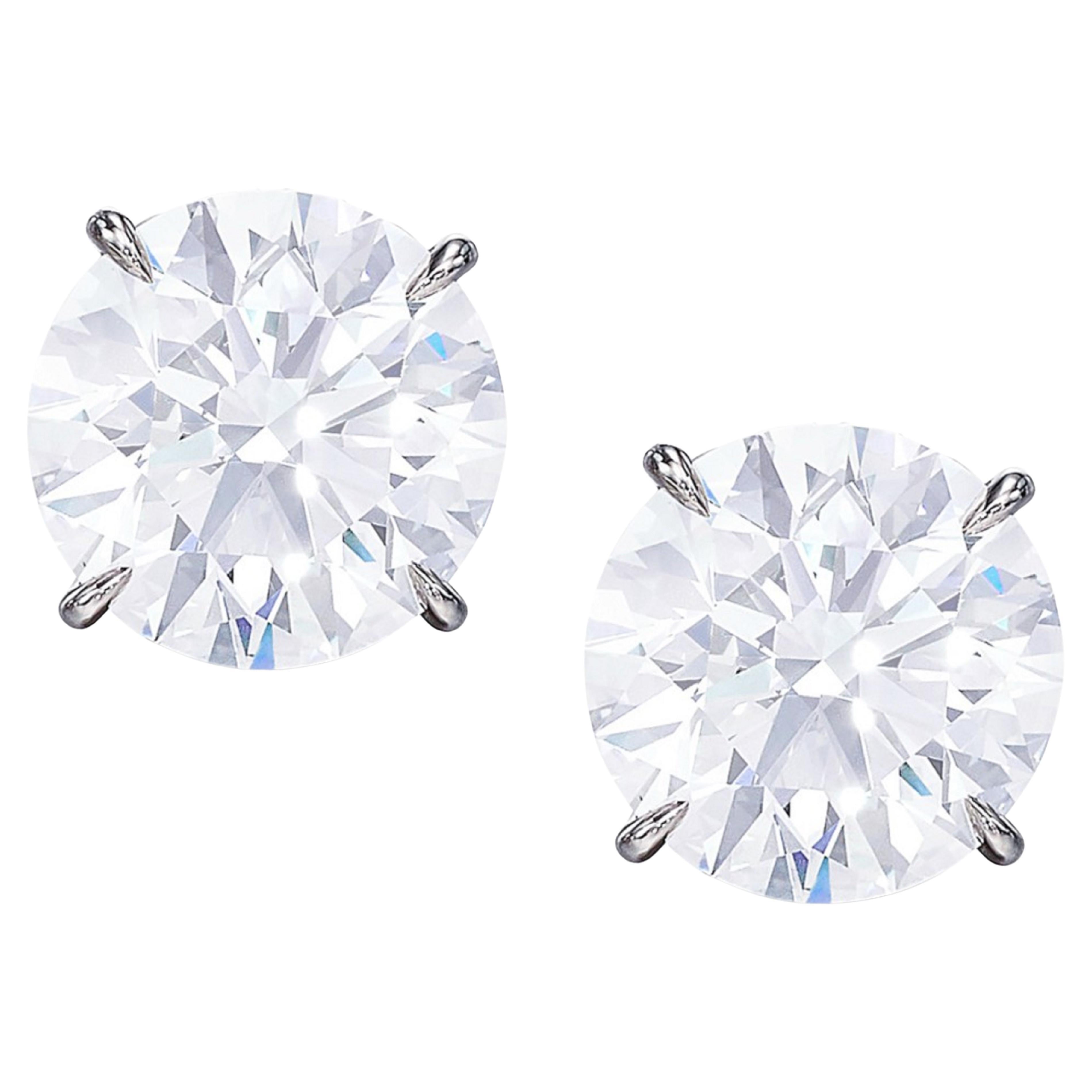 Exceptionnelles boucles d'oreilles en platine certifiées GIA et ornées d'un diamant rond de 6 carats à taille brillante