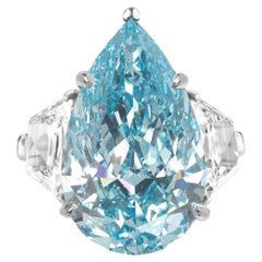 Exceptional GIA Certified 6.20 Carat Fancy Light Blue Pear Cut Diamond Ring