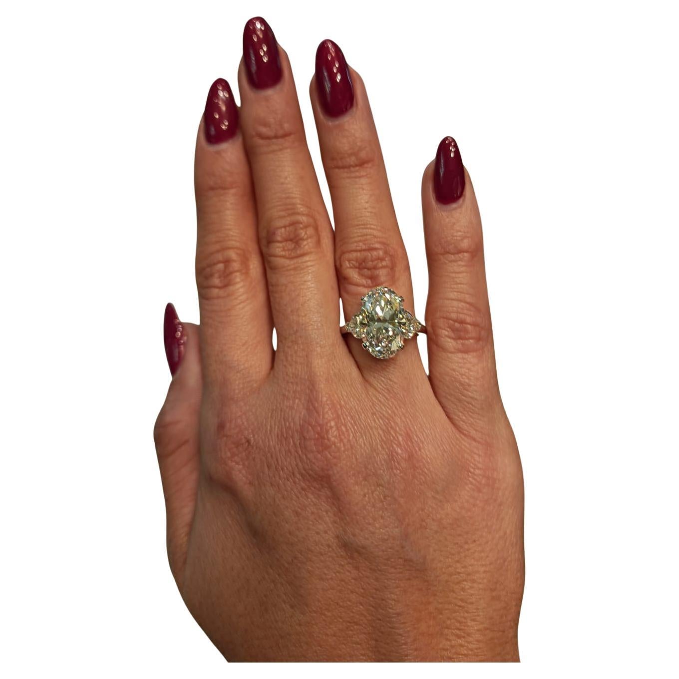 EXCEPTIONAL GIA Certified 7 Carat Oval Diamond Platinum Ring In New Condition For Sale In Chicago, IL