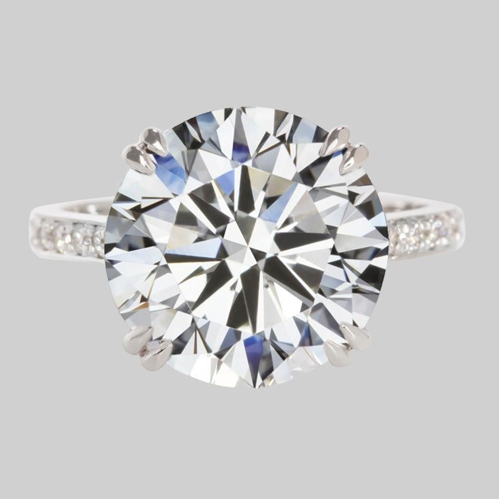 This unique diamond ring is proudly offered by Antinori Fine Jewels

This 9.80 carat GIA certified E Color VVS2 Clarity round brilliant cut triple excellent diamond measuring 12.16 - 13.79x13.86mm is custom set in a handcrafted Antinori Fine Jewels