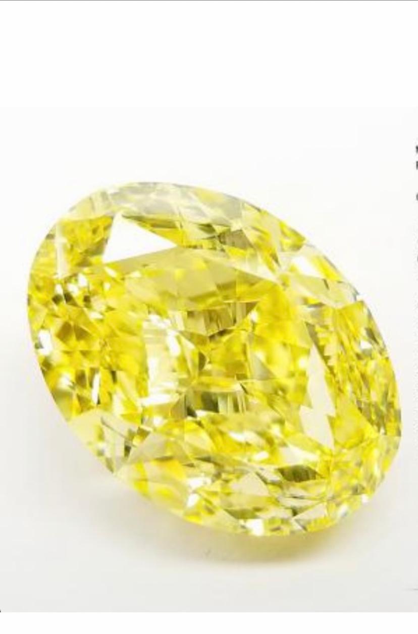 Oval Cut  Exceptional GIA Certified Ct 20, 00 Fancy Intense Yellow Diamond For Sale