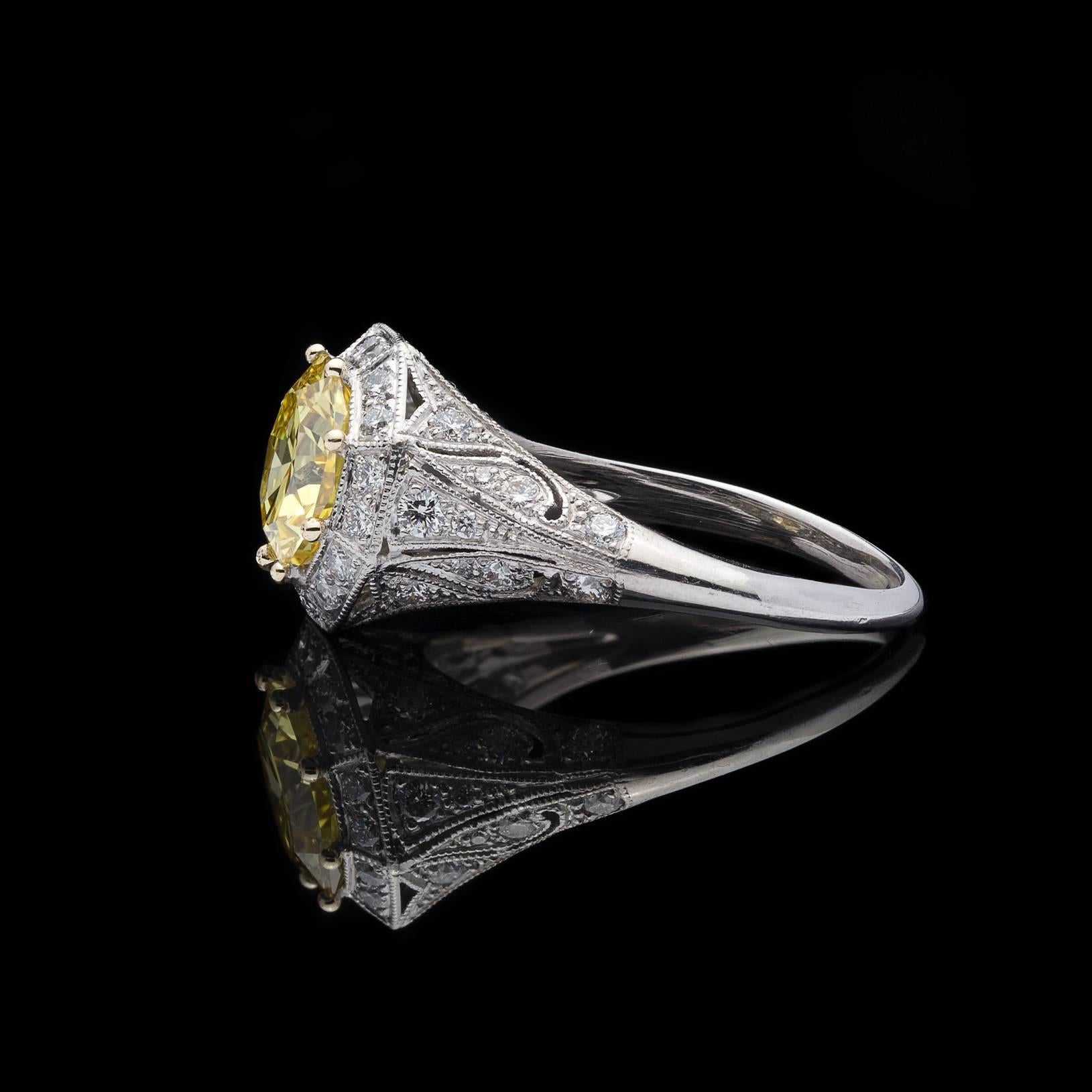 Exceptional GIA Fancy Intense Yellow Diamond in French Platinum Ring In New Condition In San Francisco, CA
