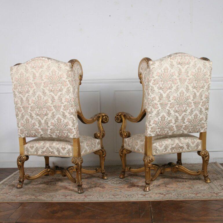This exceptional showy set of gilt armchairs are a vibrant splash of gold to enhance any living space. A kind of Louis XV hybrid of French style crossed with an English of design.