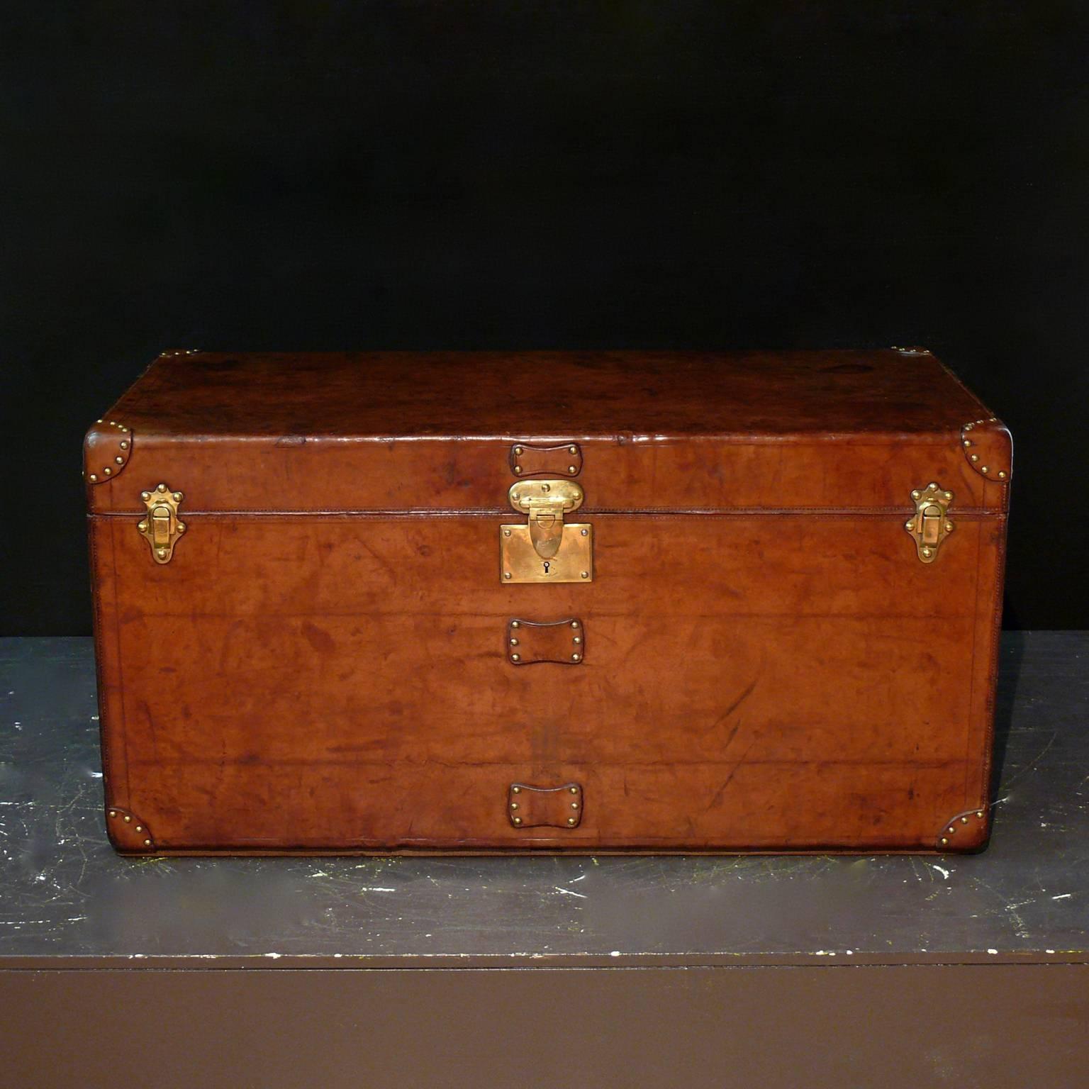 An exceptional Goyard leather steamer trunk with original cotton lined interior and brass catches and lock; circa 1910. Its particularly rare to find all-leather Goyard trunks and the quality of this example is superb.
Louis Vuitton and Goyard were