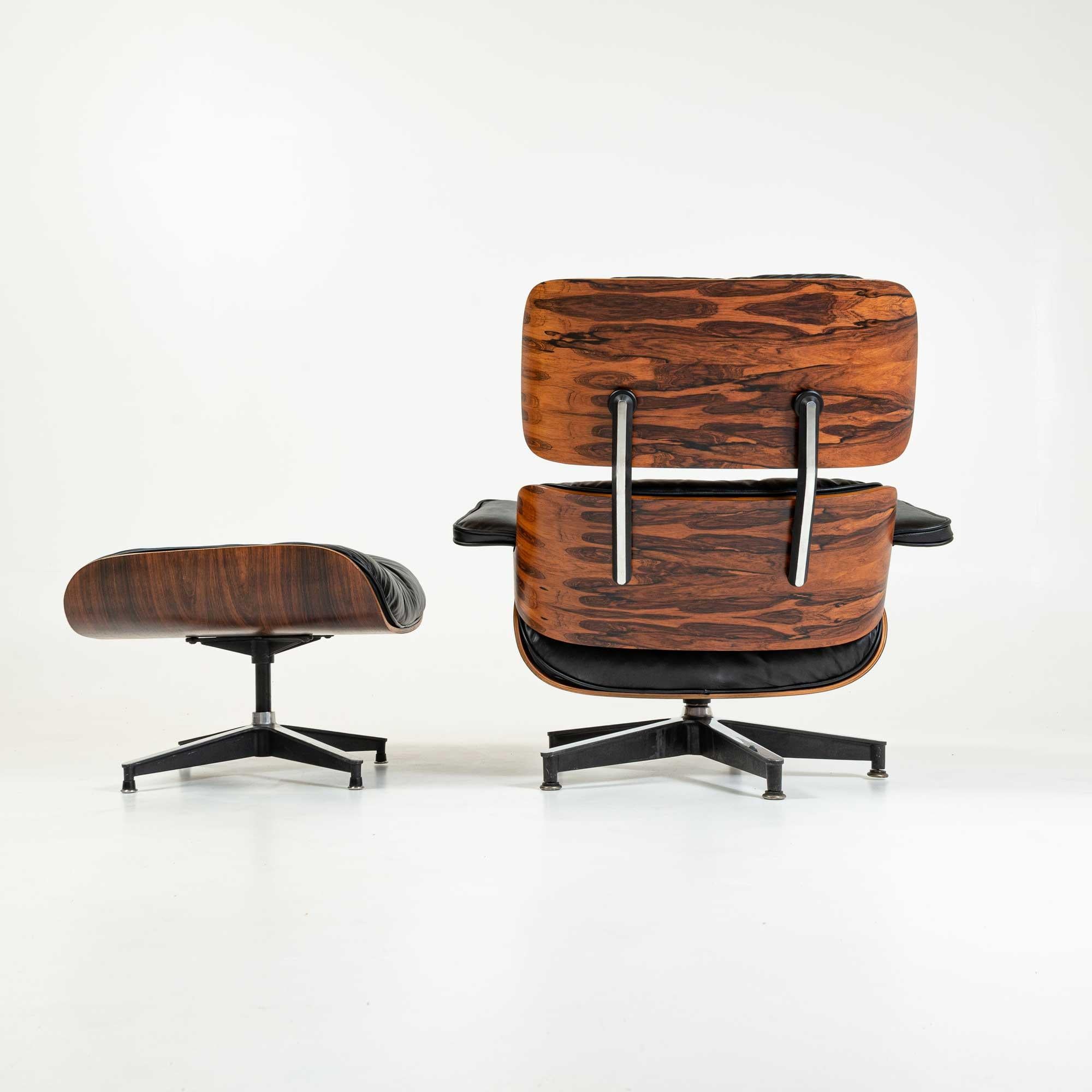 This extremely rare collectible is one of the early known productions of the 1956 Eames lounge chair with ottoman, non-stamped frame. In classic black and rosewood lacquered shell, this piece has been professionally restored and includes all the
