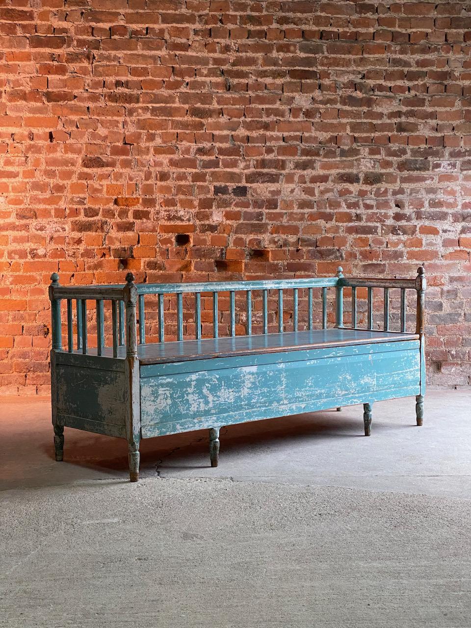 Exceptional Gustavian painted bench settle, Sweden, circa 1800

An exquisite and charming early 19th century antique Swedish Gustavian painted pine settle sofa dating to circa 1800, the balustraded back with turned upright supports featuring